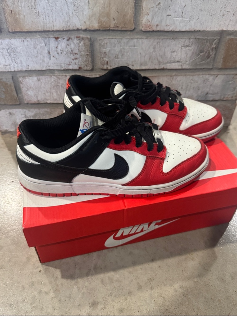 Nike Kids Low-Top Sneakers in Red, White, and Black